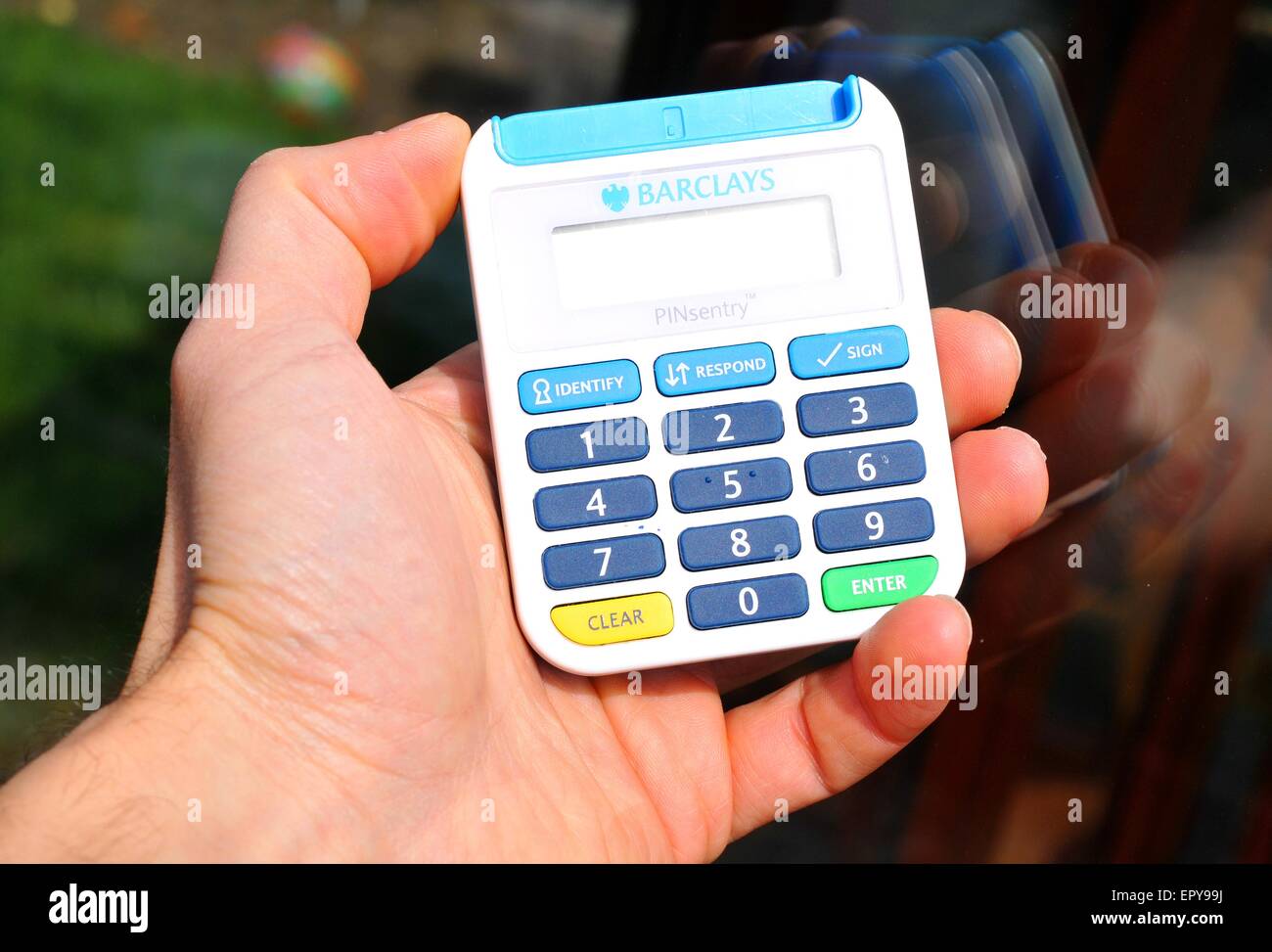 Online banking PINsentry security chip and pin card reader for authorising transactions through Barclays Bank account Stock Photo