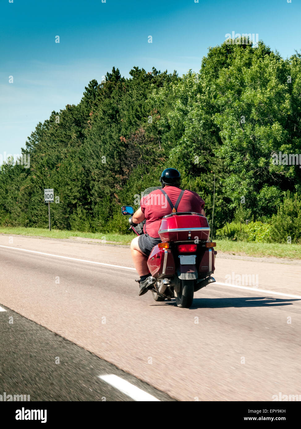 Fat man riding motorcycle hi-res stock photography and images - Alamy