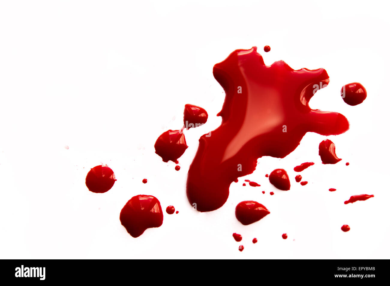 Blood stains (puddle, pool, splatter) isolated on white background close up, horizontal Stock Photo