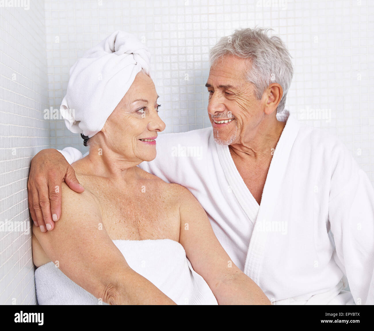 Senior couple sitting for relaxation in a spa in their holidays Stock Photo