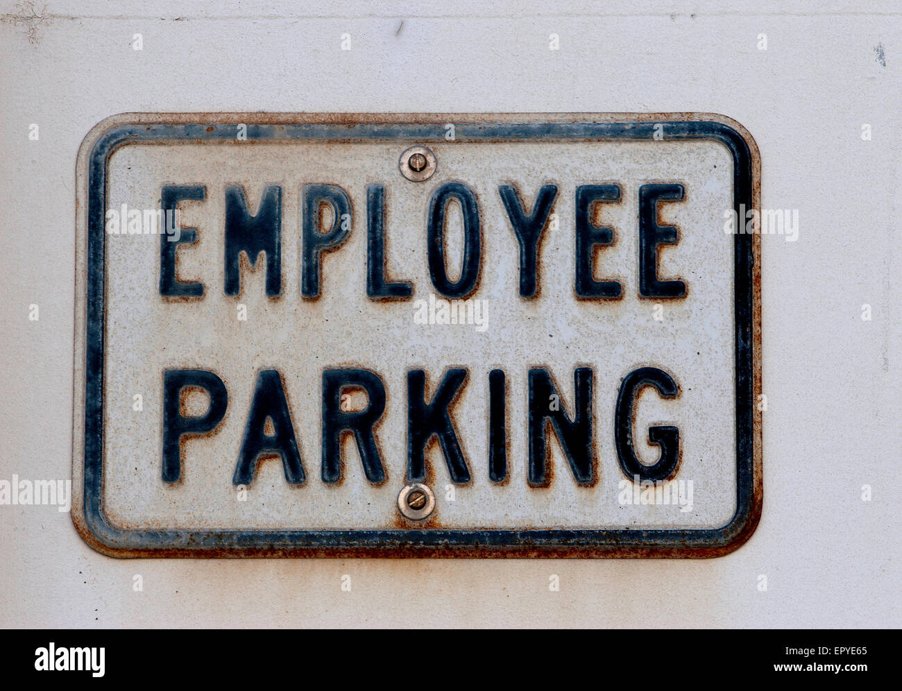 Car park sign for Employees only, in a car park in Holyhead, North Wales Stock Photo