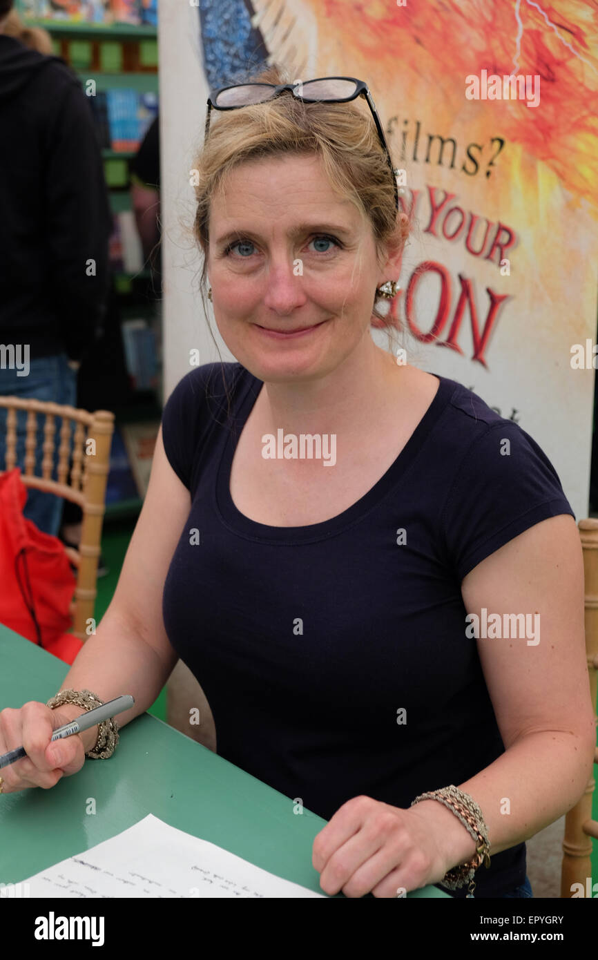 Hay Festival, Powys, Wales - 23rd May 2015 - Day 3 - Best selling childrens author Cressida Cowell signing her books in the bookshop. Her How to train your Dragon series of books are bestsellers. Stock Photo