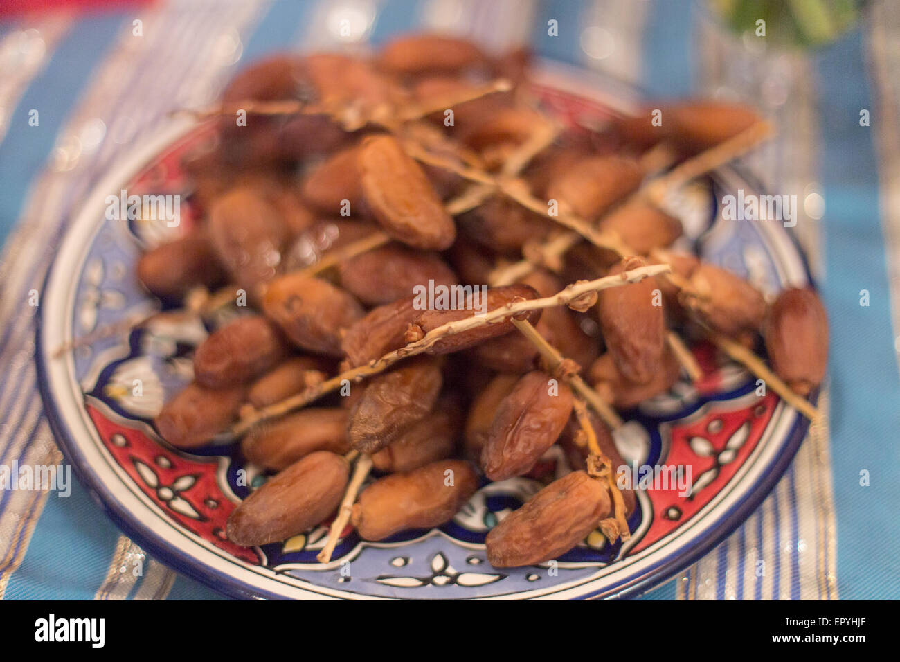 dates on the vine on a plate Stock Photo