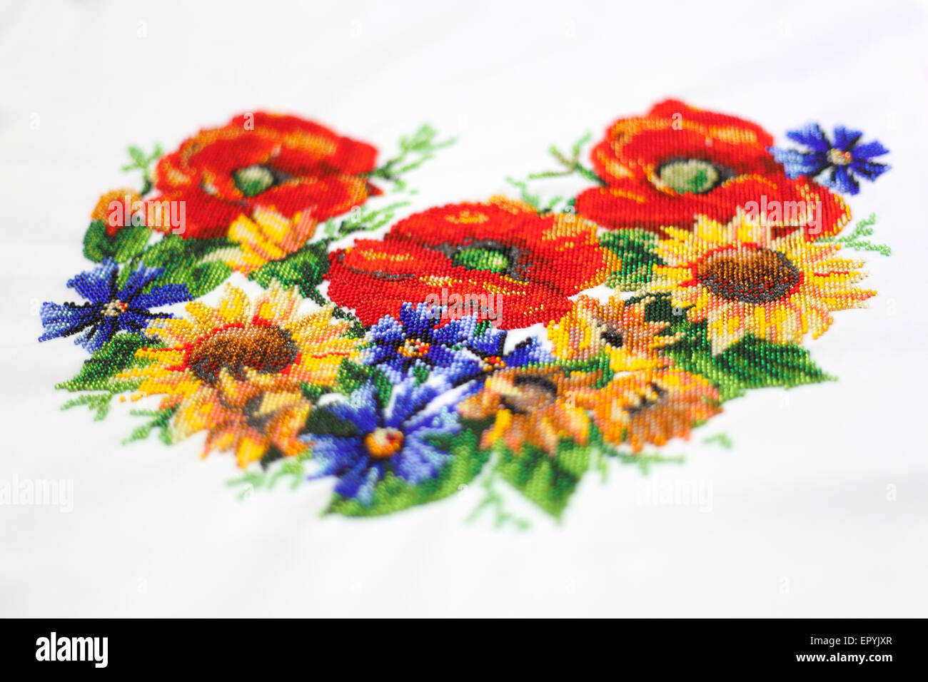 Ukrainian embroidery. Embroidery beads. Pattern of flowers Stock Photo