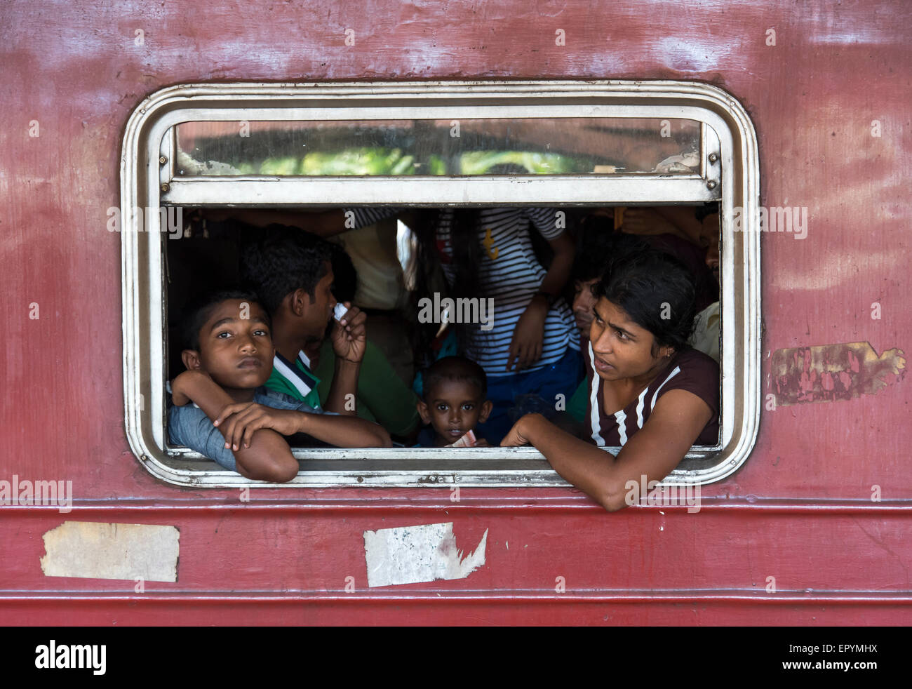 Travelers on Busy Train, Colombo Fort Station, Sri Lanka Stock Photo