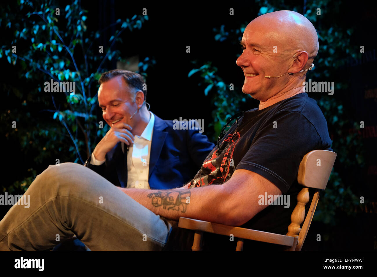 Hay Festival, Powys, Wales - May 2015  -  Author Irvine Welsh on stage in conversation with Andrew O'Hagan  talking about his latest book A Decent Ride. Stock Photo