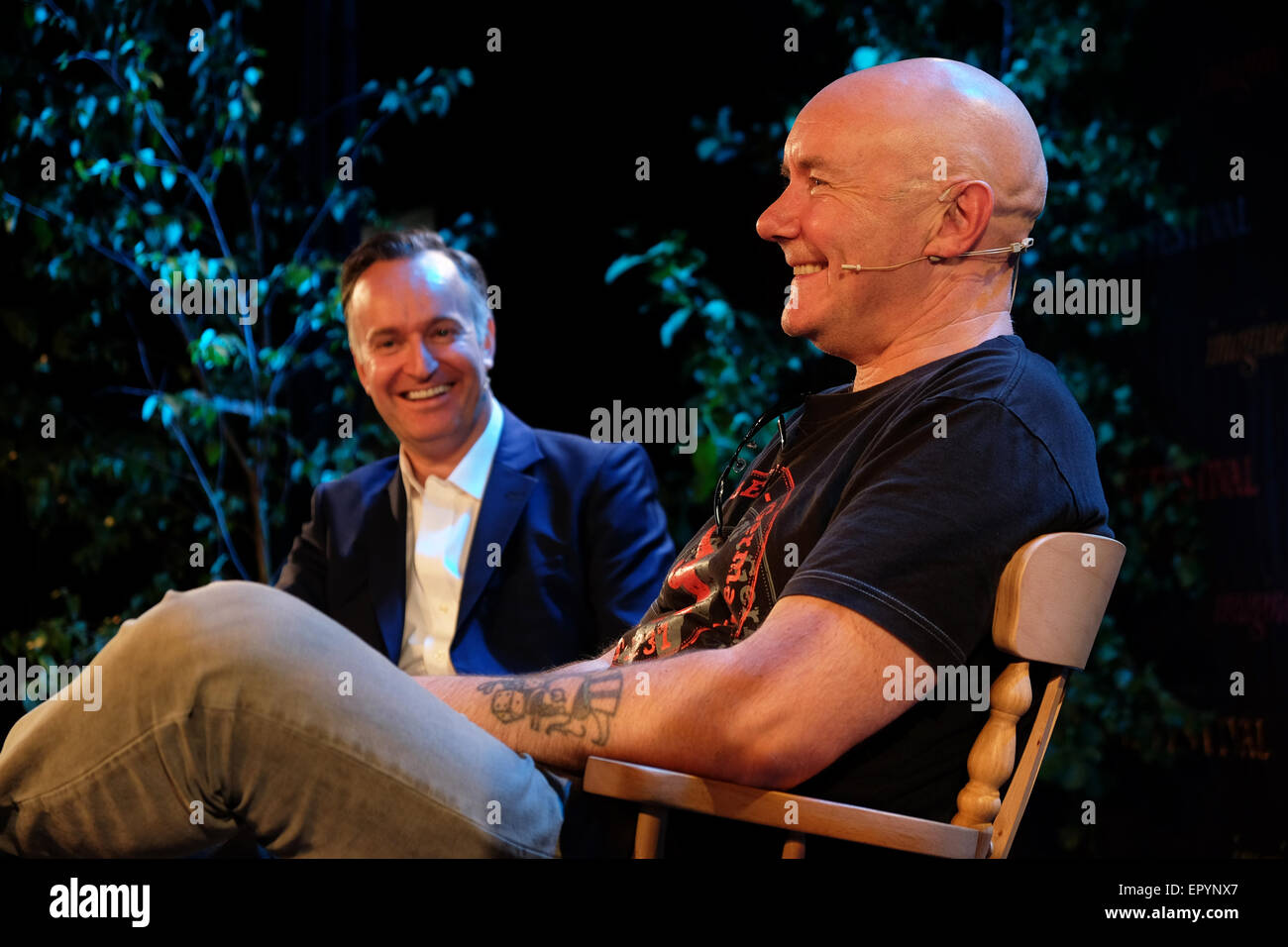 Hay Festival, Powys, Wales - May 2015  - Author Irvine Welsh on stage in conversation with Andrew O'Hagan  talking about his latest book A Decent Ride. Stock Photo