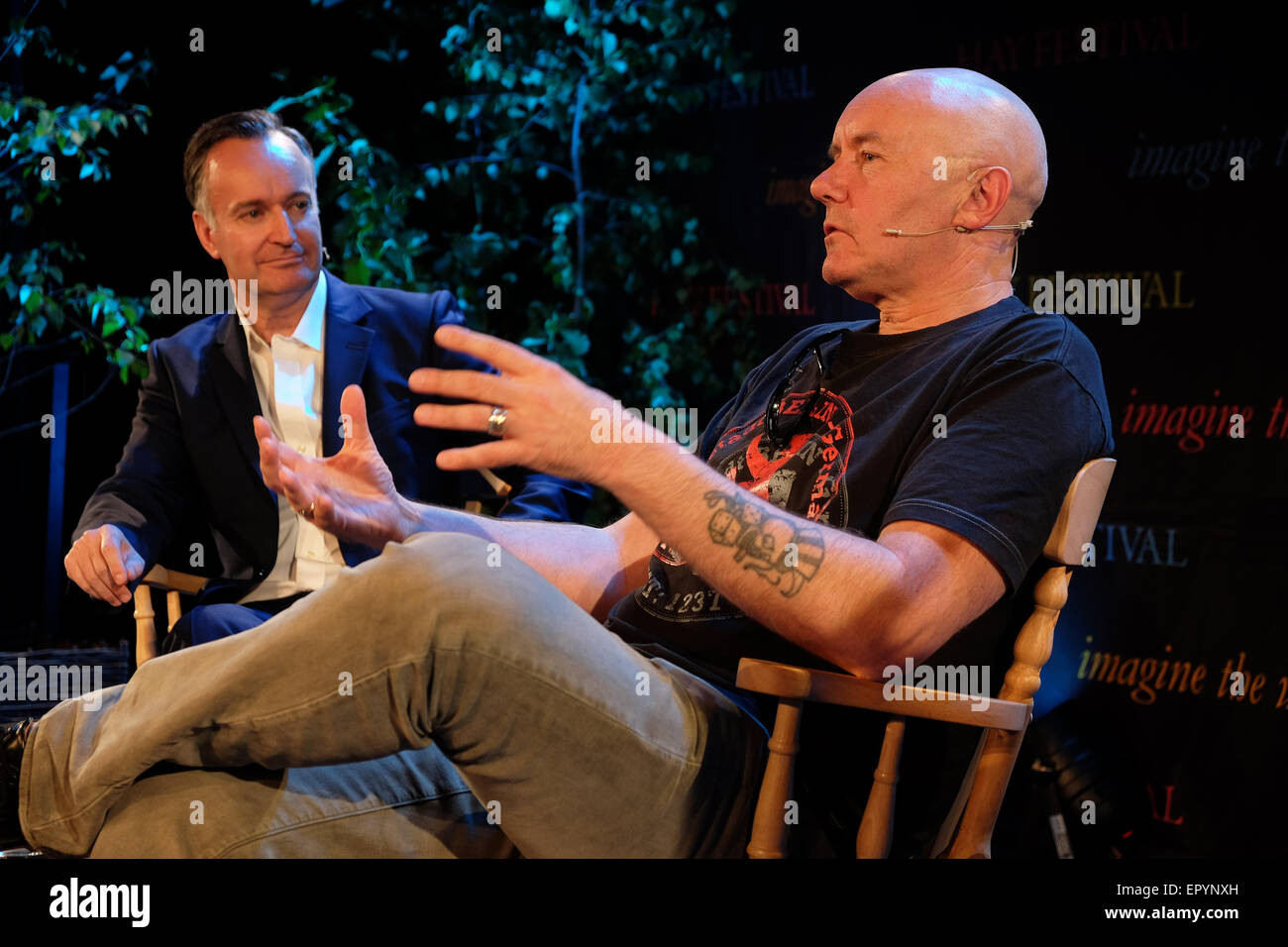 Hay Festival, Powys, Wales - May 2015  -  Author Irvine Welsh on stage in conversation with Andrew O'Hagan  talking about his latest book A Decent Ride. Stock Photo
