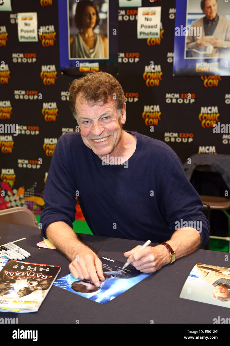 London, UK. 23rd May 2015. Actor John Noble signing autographs at MCM Comic Con, Excel, London 2015 where fans dressed as their favourite film, TV, Cosplay and fantasy characters. Stock Photo
