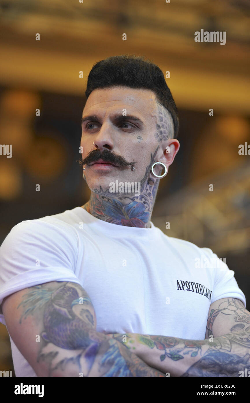 A catwalk model at The Great British Tattoo Show, a prestigious body art convention being held at Alexandra Palace, London. The show had 249 tattoo artists from all around the world and