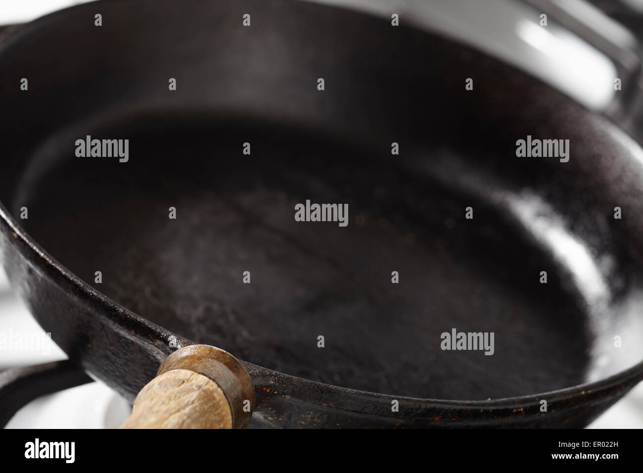 cast iron frying pan on the stove Stock Photo Alamy