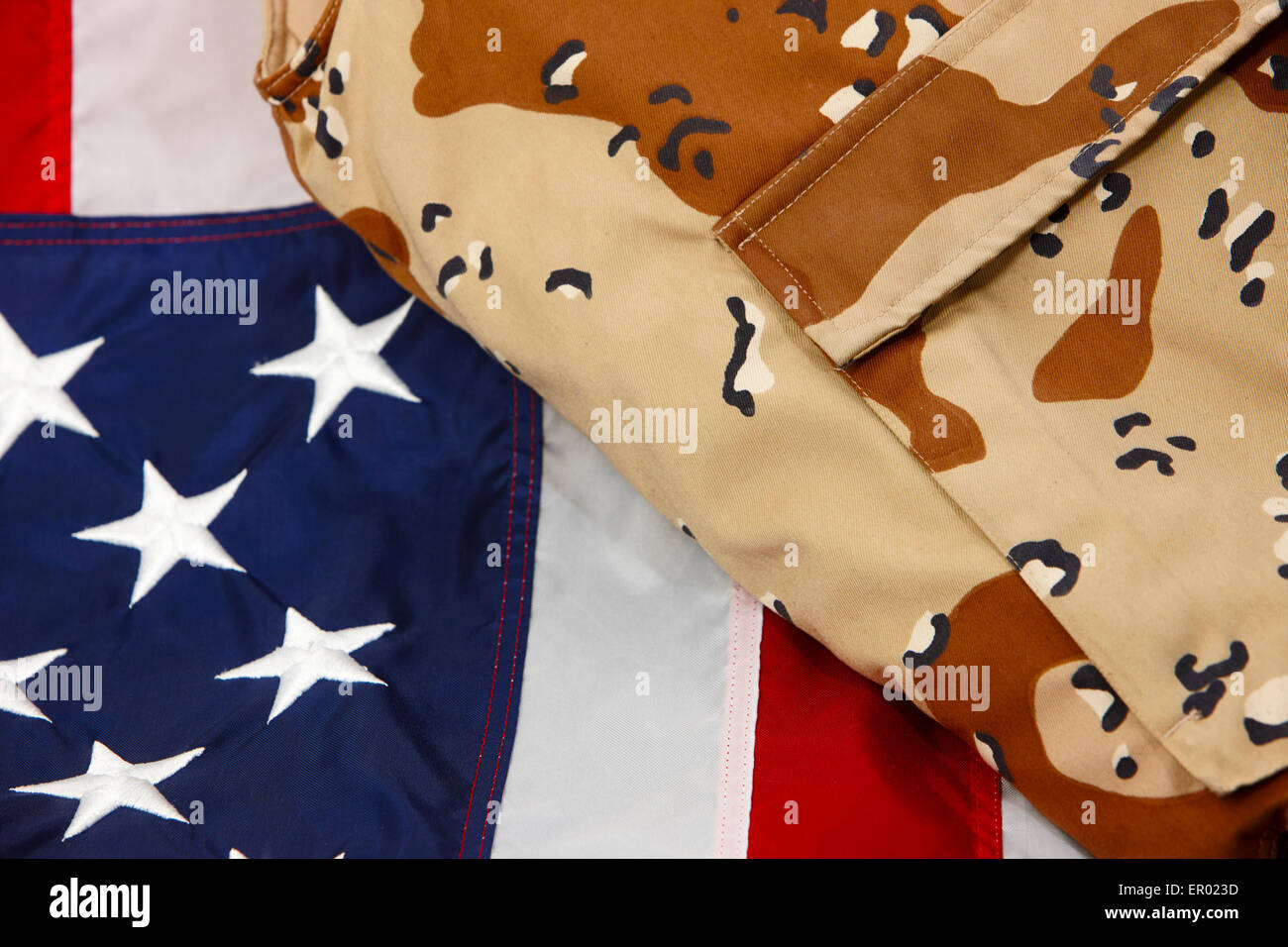 desert battle dress uniform from the persian gulf war on united states of america flag Stock Photo