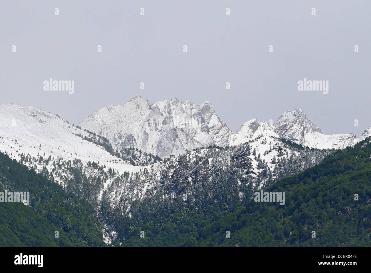 Spring snow in the mountains Stock Photo