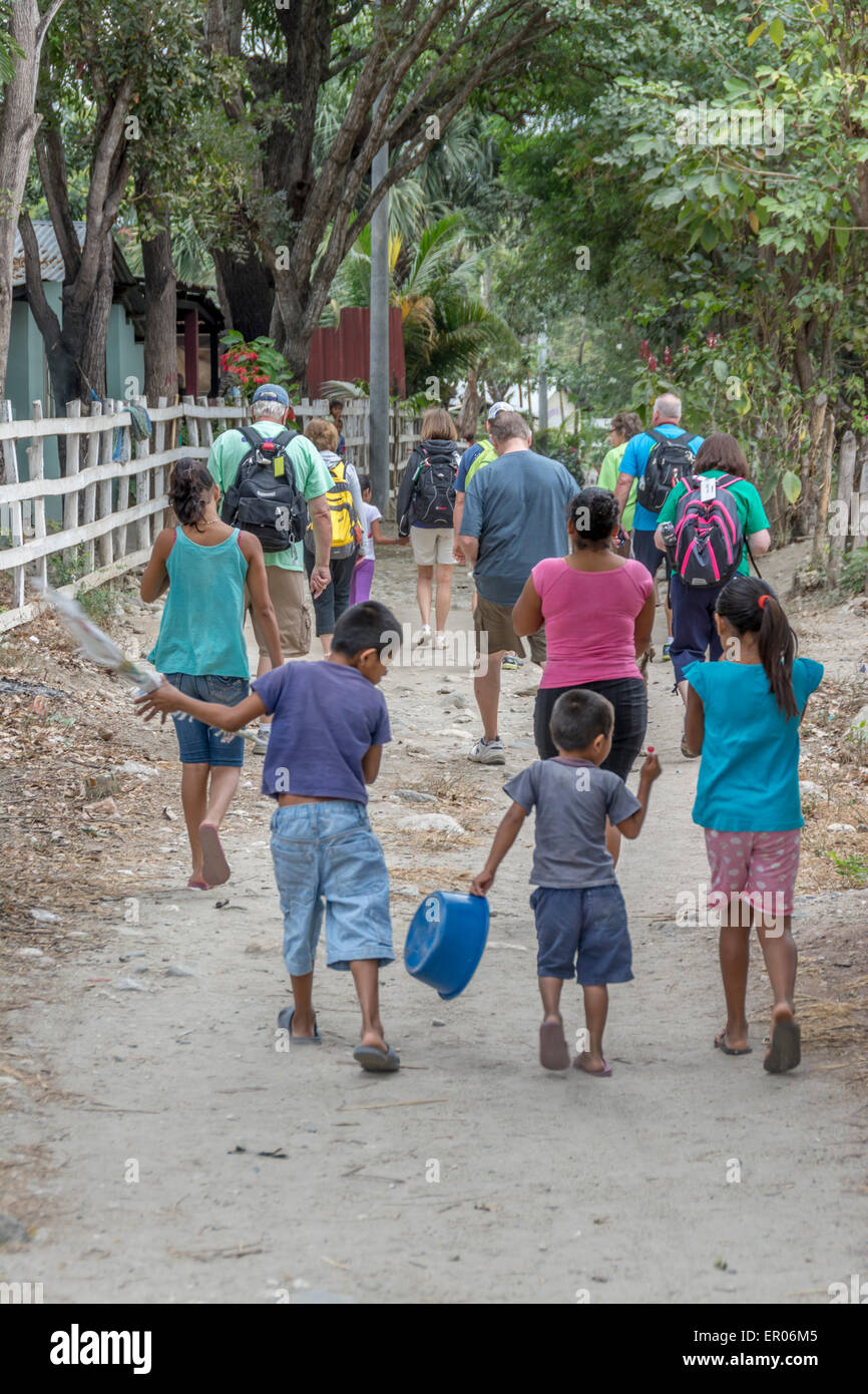 Missionary group visiting a village in Guatemala Stock Photo