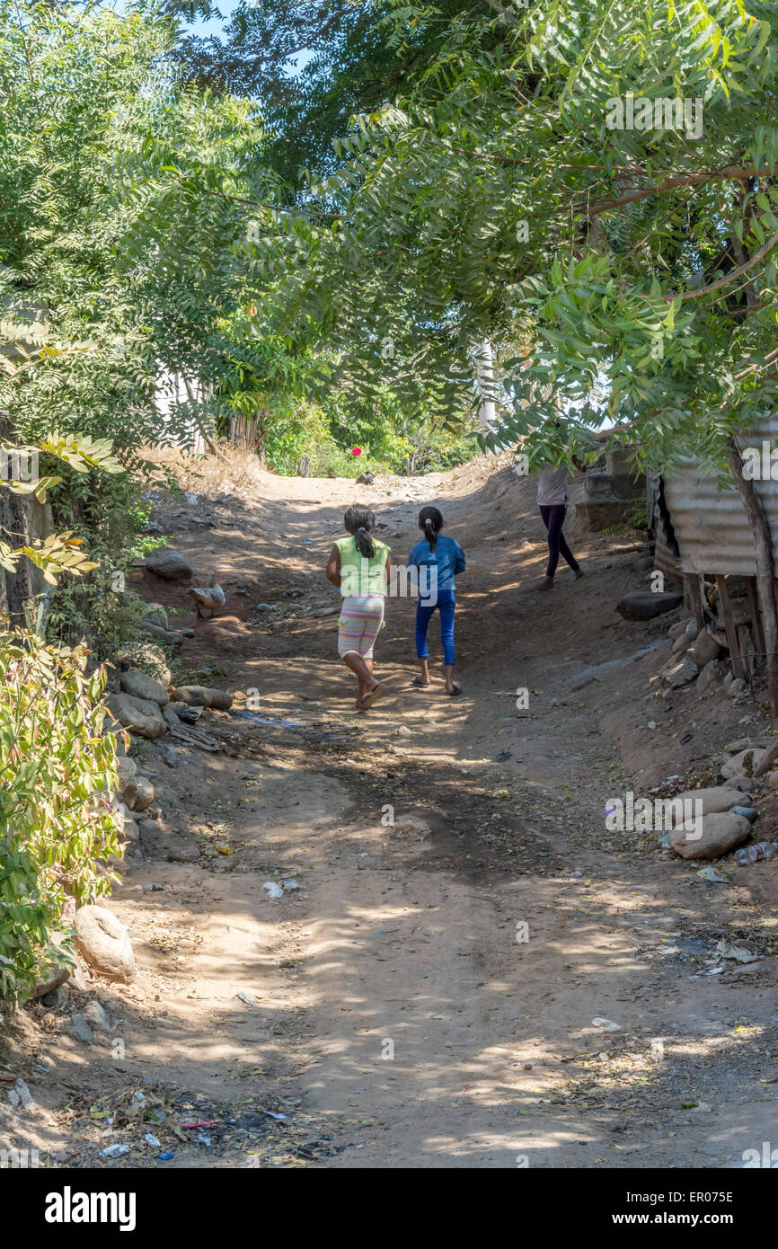 Girl walking on dirt road hi-res stock photography and images - Alamy