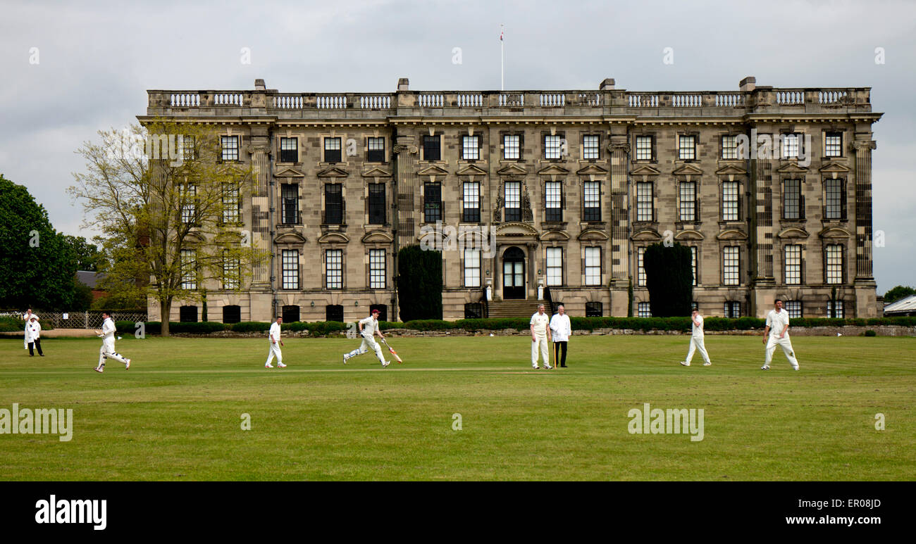 Stoneleigh, Warwickshire, England, UK. 23rd May, 2015. Stoneleigh Abbey forms an impressive backdrop to the Cotswold Hills League Division 4 cricket game between Stoneleigh Cricket Club and Inkberrow. Credit:  Colin Underhill/Alamy Live News Stock Photo