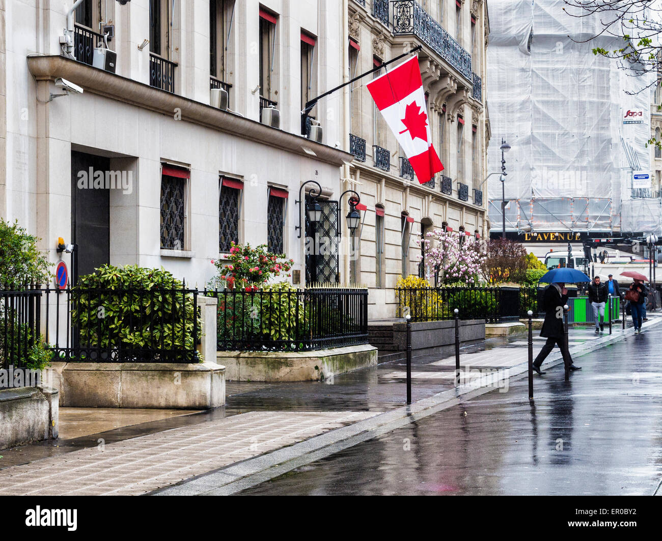 Paris Canadian Embassy building exterior and Maple leaf red and white  Canadian flag, Avenue Montaigne Stock Photo - Alamy