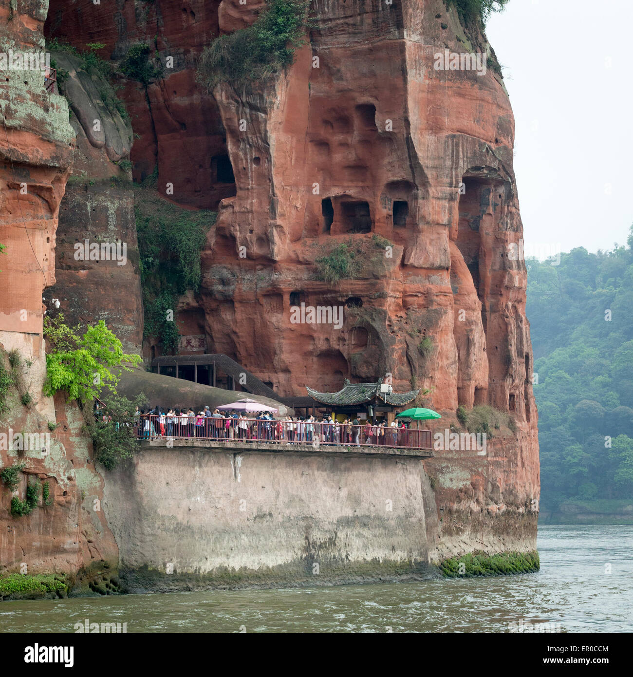 Leshan giant Buddha (Dafo) carved out of the cliff face at the Mingjian, Dadu and Qingyi rivers during the Tang Dynasty Stock Photo