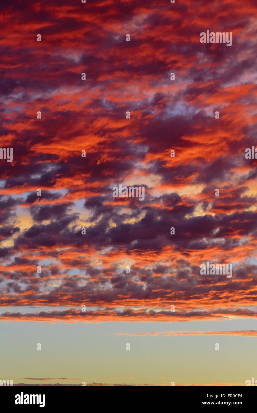 Clouds on sunset red atmosphere sky background Stock Photo - Alamy