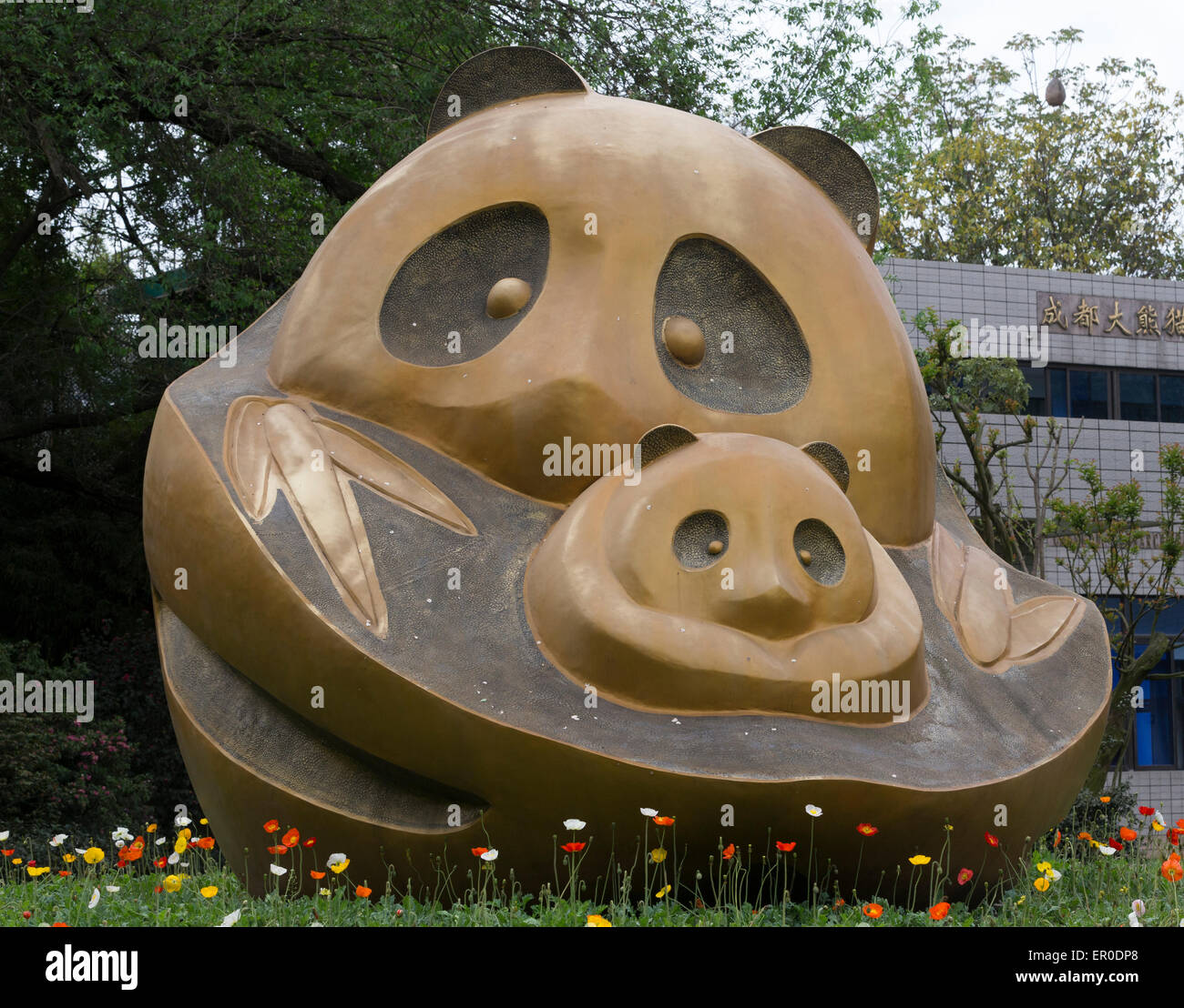 A semi-abstract sculpture of a giant panda and her cub at the Chengdu Panda Breeding and Research Center Stock Photo