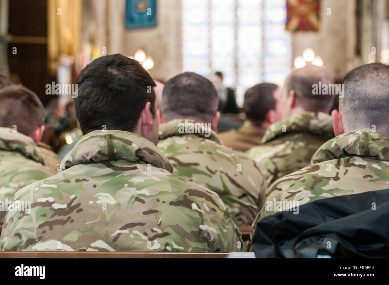 Carrickfergus, Northern Ireland. 23rd May, 2015. Soldiers sitting in pews in an old church Credit:  Stephen Barnes/Alamy Live News Stock Photo