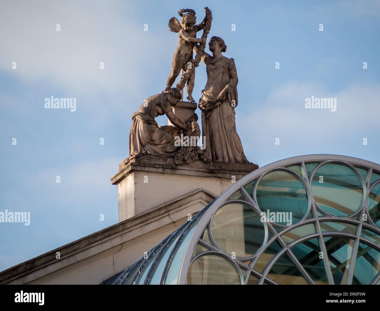 Detail of the Royal Opera House facade roof statues Stock Photo