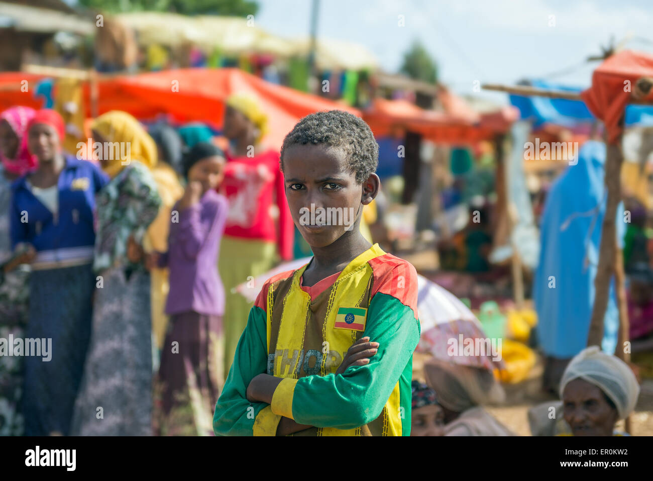 Young ethiopian boy at a popular local market near Addis Abbaba. Stock Photo