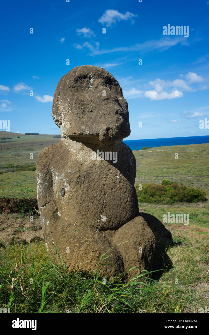 Kneeling Moai in Rano Raraku, Rapa Nui National Park, Easter Island, Chile, Unesco World Heritage Stock Photo