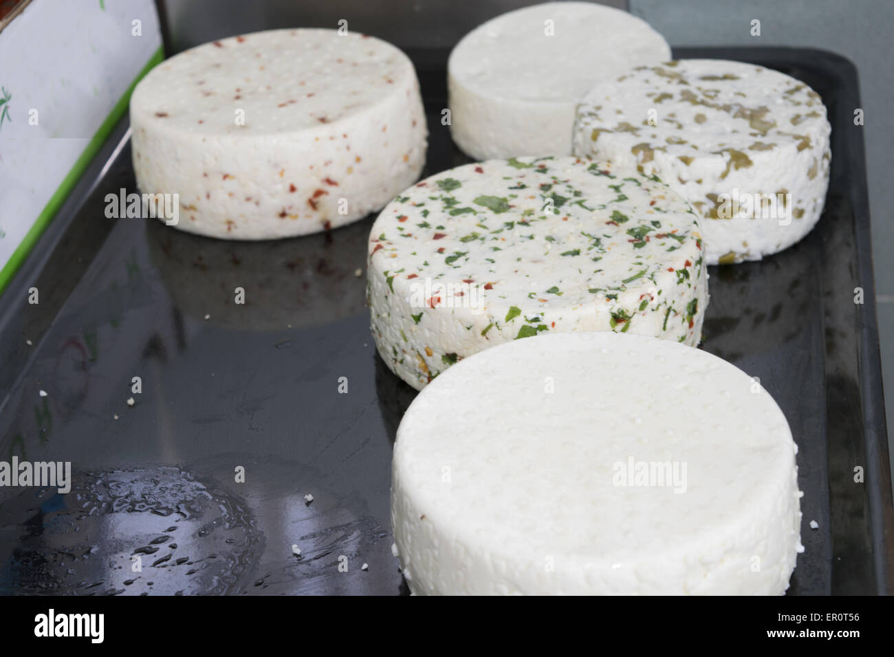 handmad shapes of spiced pecorino cheeses seasoned with aromatic herbs