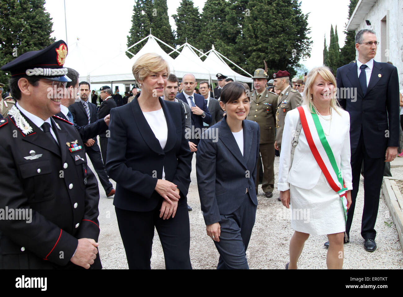 Gorizia, Italy. 24th May, 2015. Defense Minister Roberta Pinotti (L) with the Regional President Debora Serracchiani and The Mayor of Sagrado Elisabetta Pian during the visit of the Italian President of the Republic Sergio Mattarella in the Area Sacra of Monte San Michele at 100th anniversary of Italy's entry into World War on 24 Sunday May 2015 in Sagrado (Go). Credit:  Andrea Spinelli/Alamy Live News Stock Photo