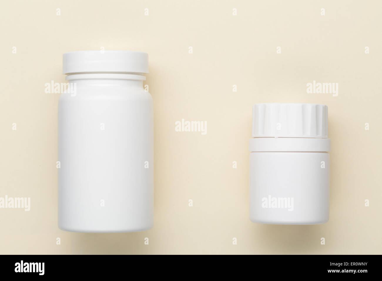 Plastic medical bottle on a beige background Stock Photo Alamy