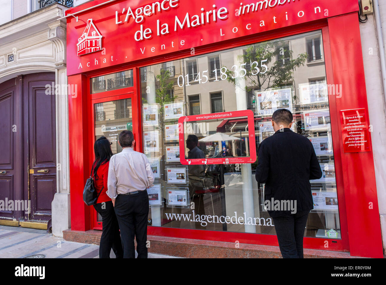 Paris, France, Couple Looking in Estate Agent Window Shopping