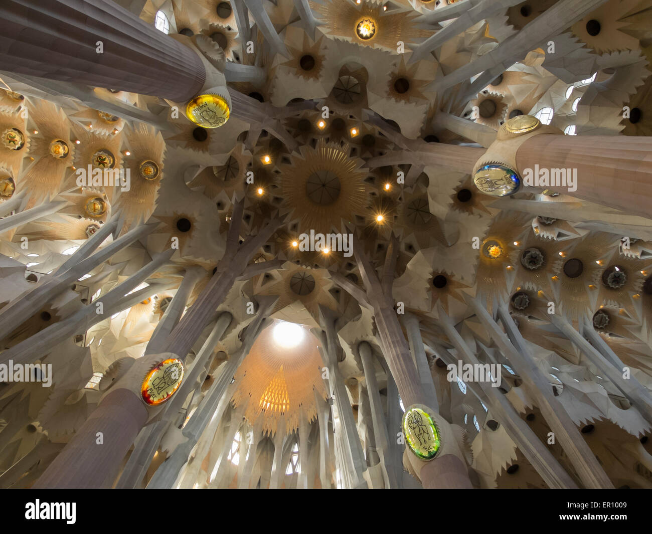 Inner view of the main alley of Gaudí's masterwork Sagrada Familia church, now being finished upon modern architecture Stock Photo