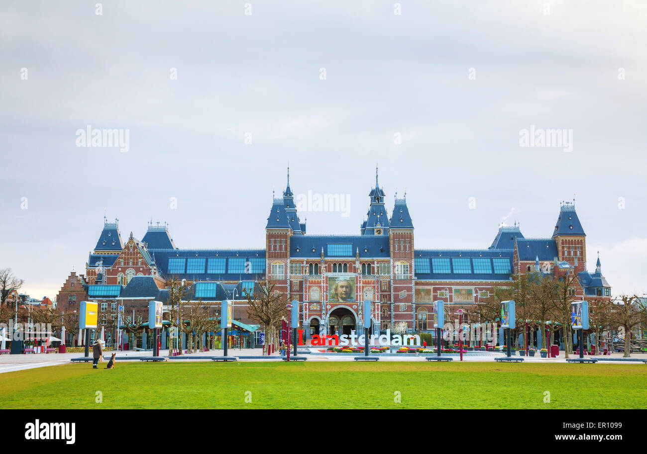 AMSTERDAM - APRIL 16: Netherlands national museum with I Amsterdam slogan on April 16, 2015 in Amsterdam. Stock Photo