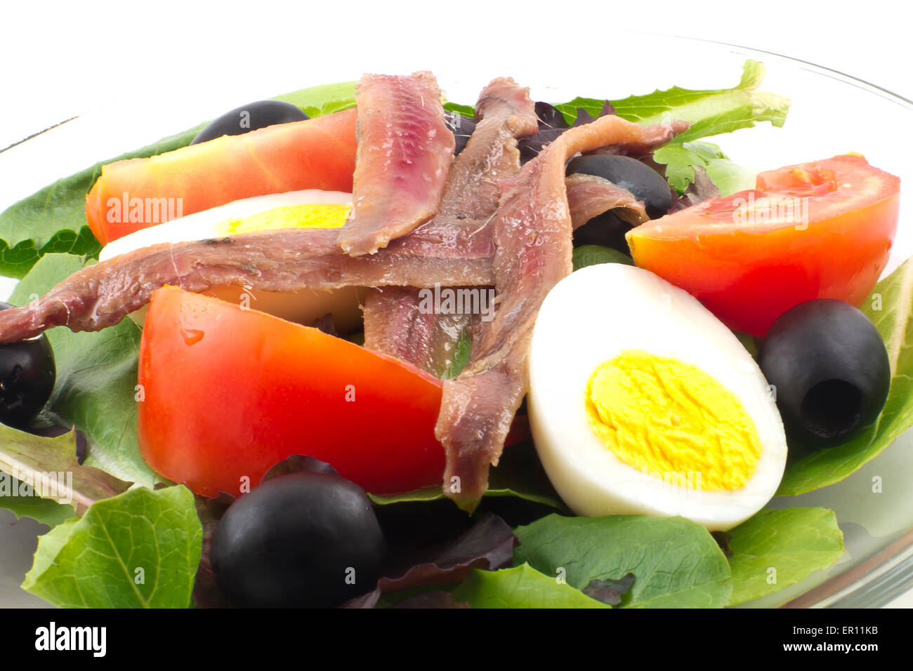 Delicious and healthy anchovy salad isolated on white background Stock
