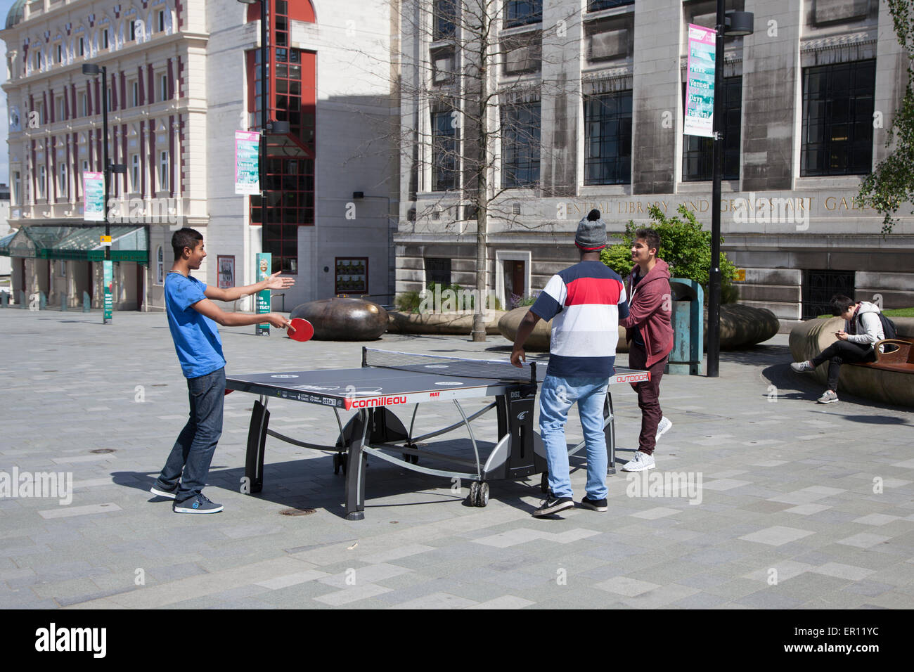 Youths playing table tennis, Sheffield City centre. Stock Photo