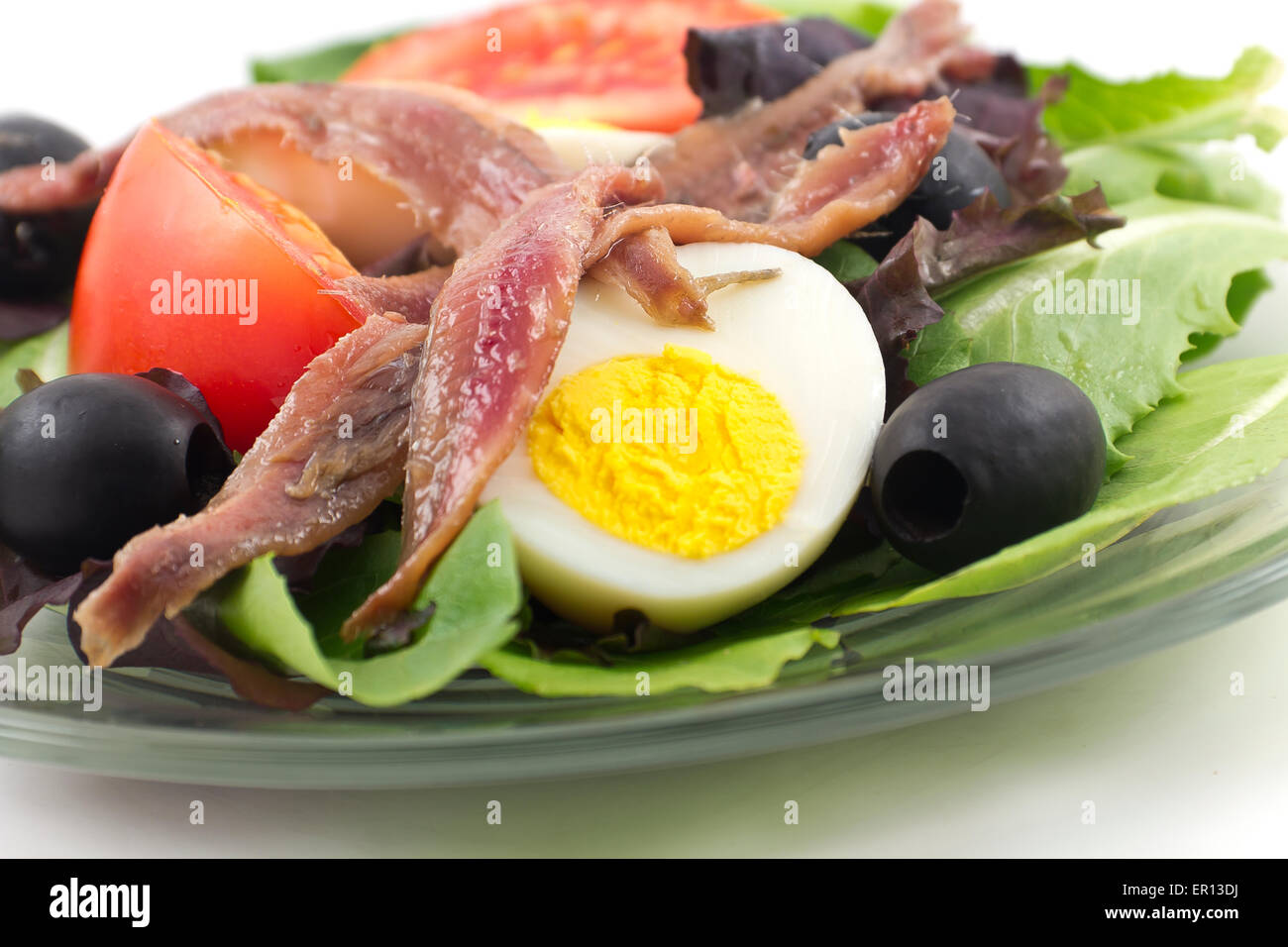 Delicious and healthy anchovy salad isolated on white background Stock