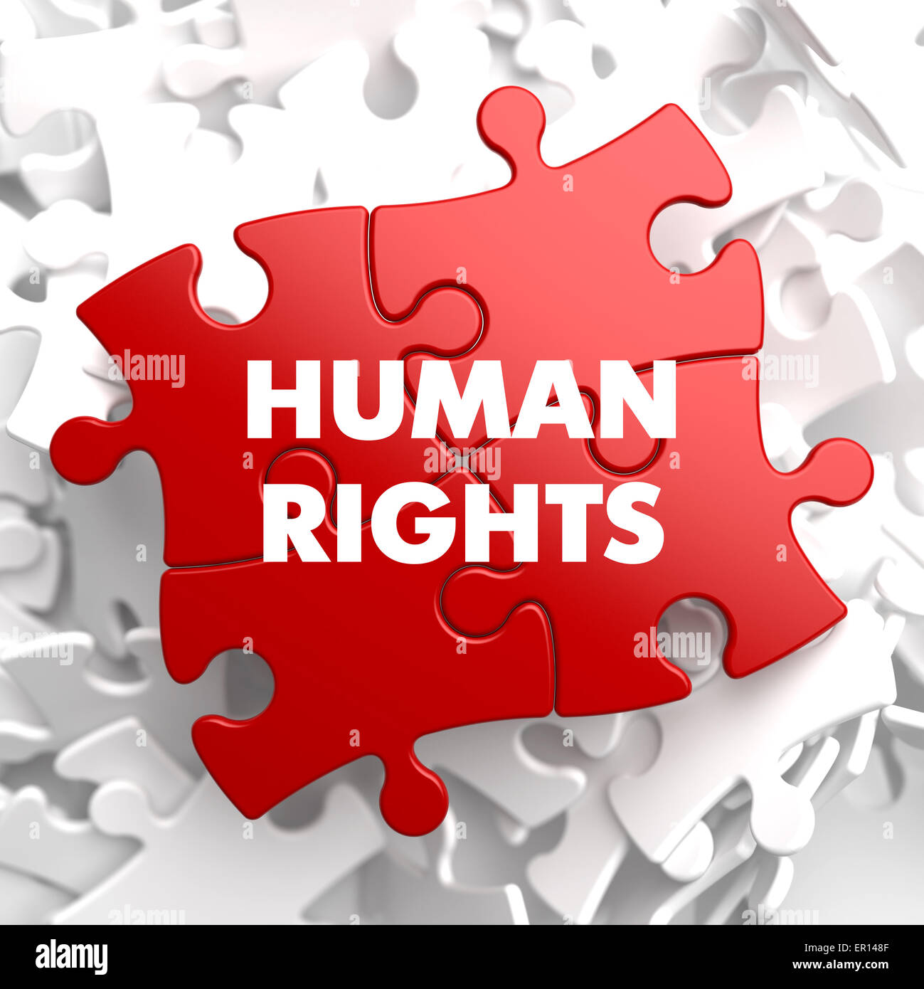 Human Rights on Red Puzzle. Stock Photo