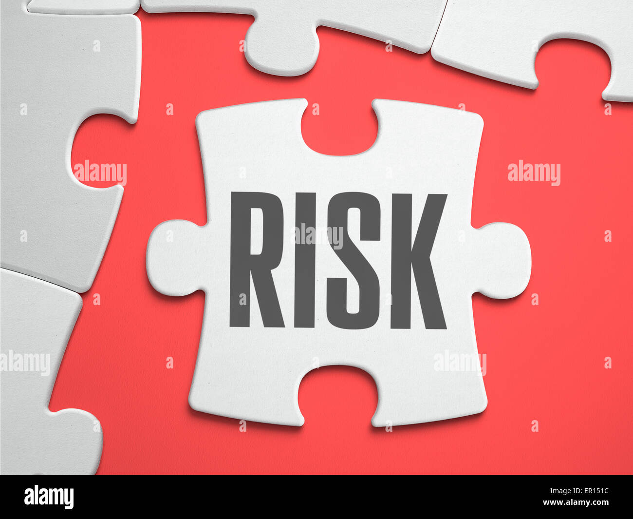 Risk - Puzzle on the Place of Missing Pieces. Stock Photo
