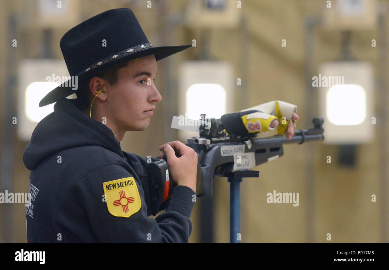 Usa. 24th May, 2015. SPORTS -- Matthew Warren who just graduated from Rio Rancho High School waits to fire during the final round of the 2015 National Rifle Association 3-Position Air-Gun Championship at West Mesa High School. Warren placed fourth in the Sporter division with a score of 83.4 in the final round and a competition total of 1249.3. Warren was a Cadet Captain in the Rio Rancho MCJROTC. © Greg Sorber/Albuquerque Journal/ZUMA Wire/Alamy Live News Stock Photo