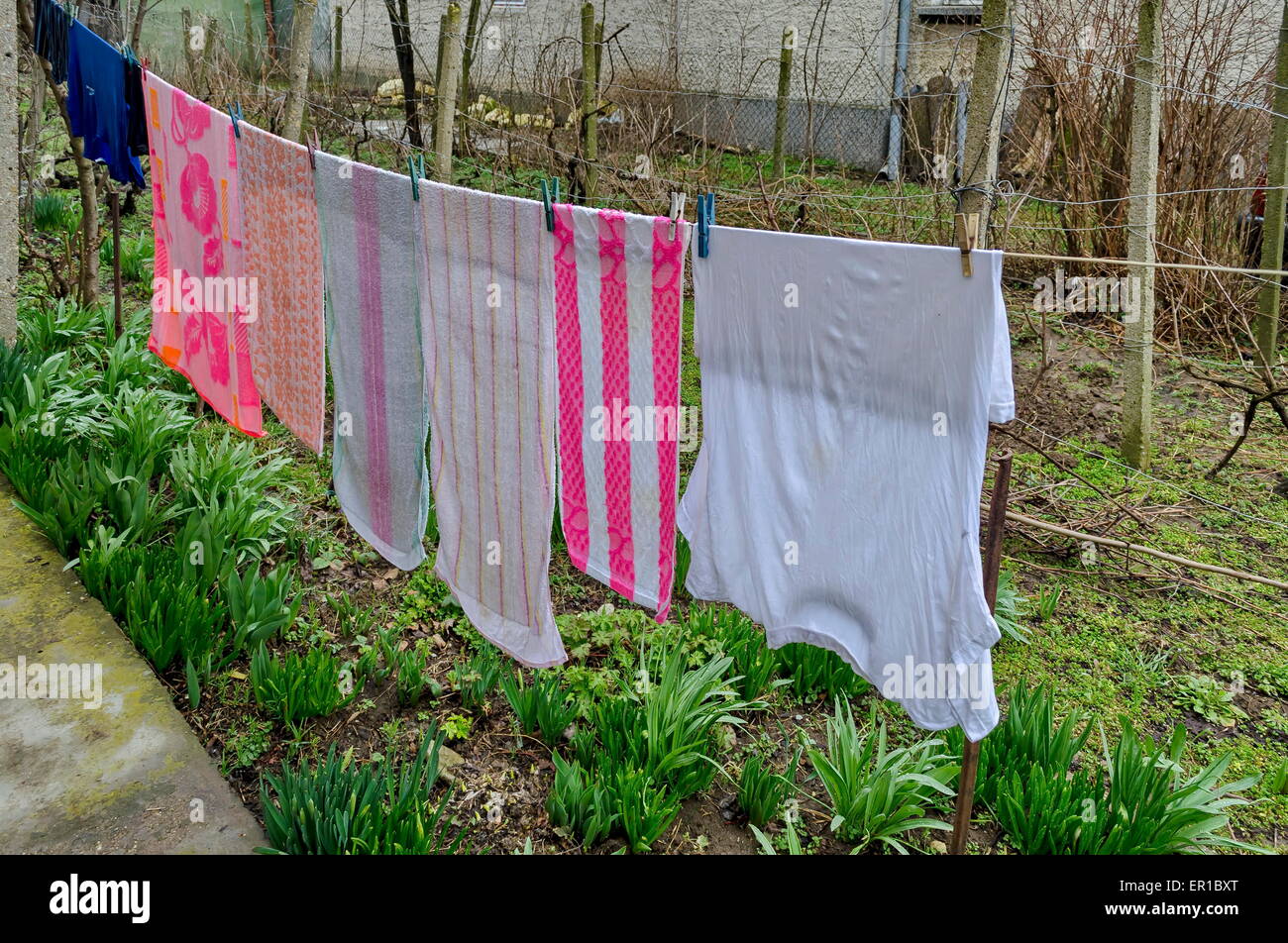 Washing clothing hang out in home yard Stock Photo