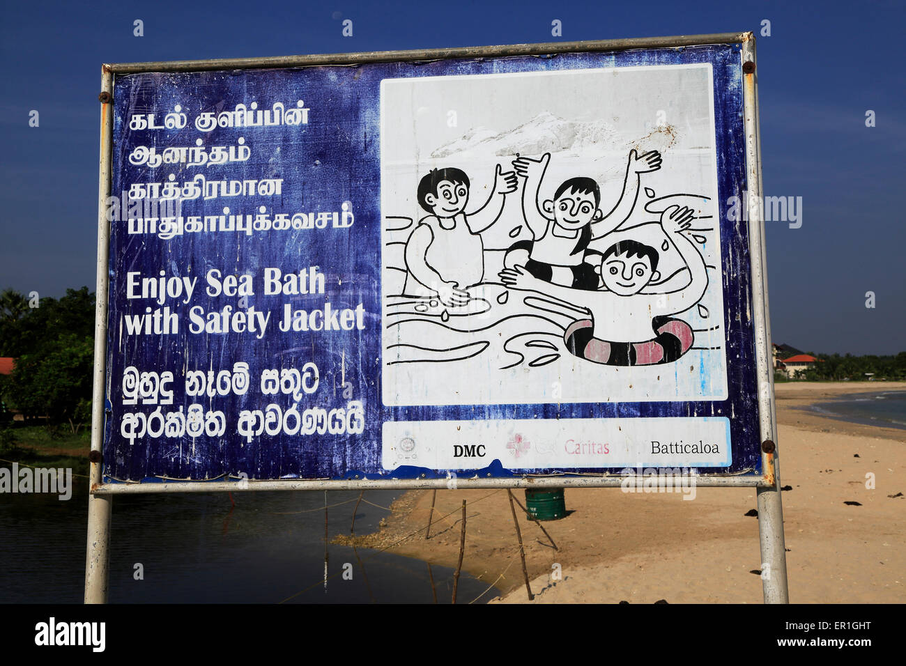 Information sign about bathing with safety jackets, Pasikudah Bay
