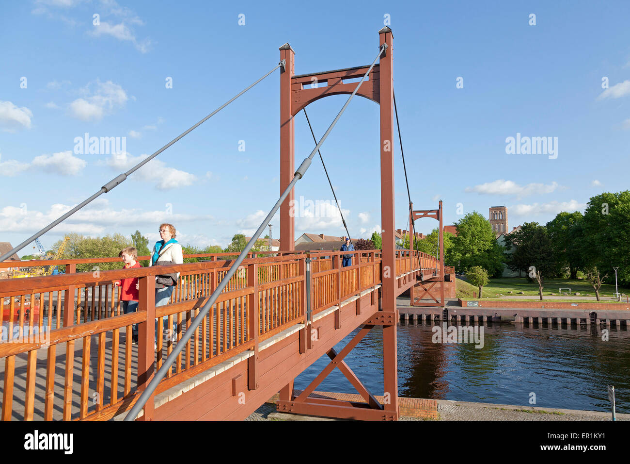 Small bridge across river people hi-res stock photography and images ...