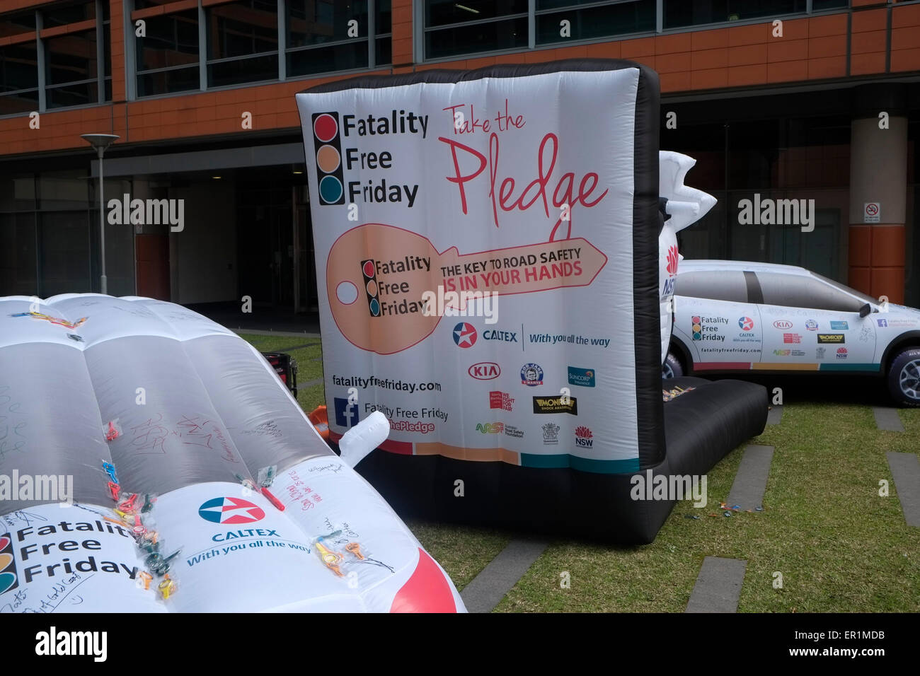 Sydney, Australia. 25th May, 2015. Inflatable cars and motorbike in Chippendale Sydney to encourage the community to sign and take the pledge ahead of Australia's Fatality Free Friday day on 29 May 2015 to eliminate all road deaths on this day and road safety. Credit:  model10/Alamy Live News Stock Photo