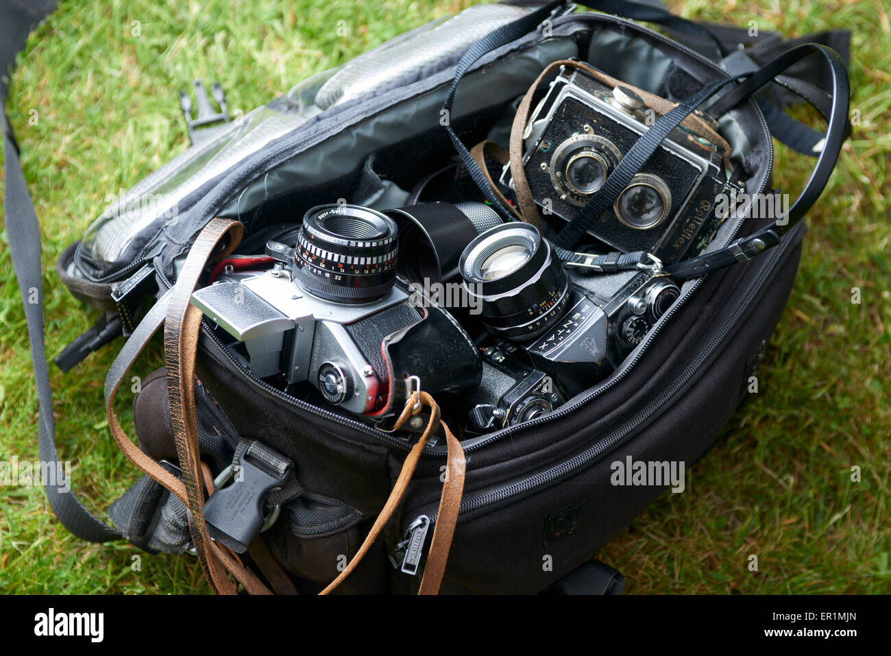 overhead image of group old vintage cameras gear needed for old school