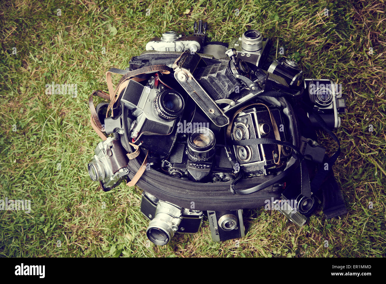 overhead image of group old vintage cameras gear needed for old school film photography enthusiasts Stock Photo