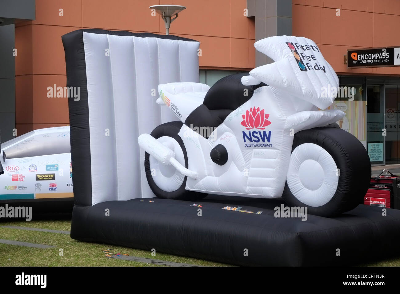 Sydney, Australia. 25th May, 2015. Inflatable cars and motorbike in Chippendale Sydney to encourage the community to sign and take the pledge ahead of Australia's Fatality Free Friday day on 29 May 2015 to eliminate all road deaths on this day and road safety. Credit:  model10/Alamy Live News Stock Photo