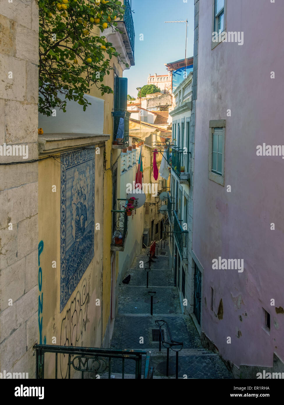 LISBON, PORTUGAL - MARCH 06, 2015: Pretty narrow Street in Lisbon Stock ...