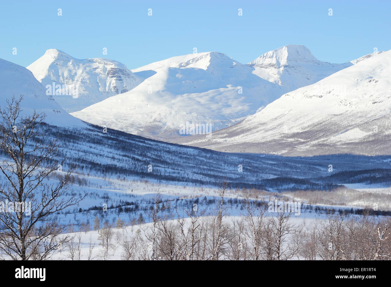 Snowy mountains. Dapmotjavri, Norway. Stock Photo