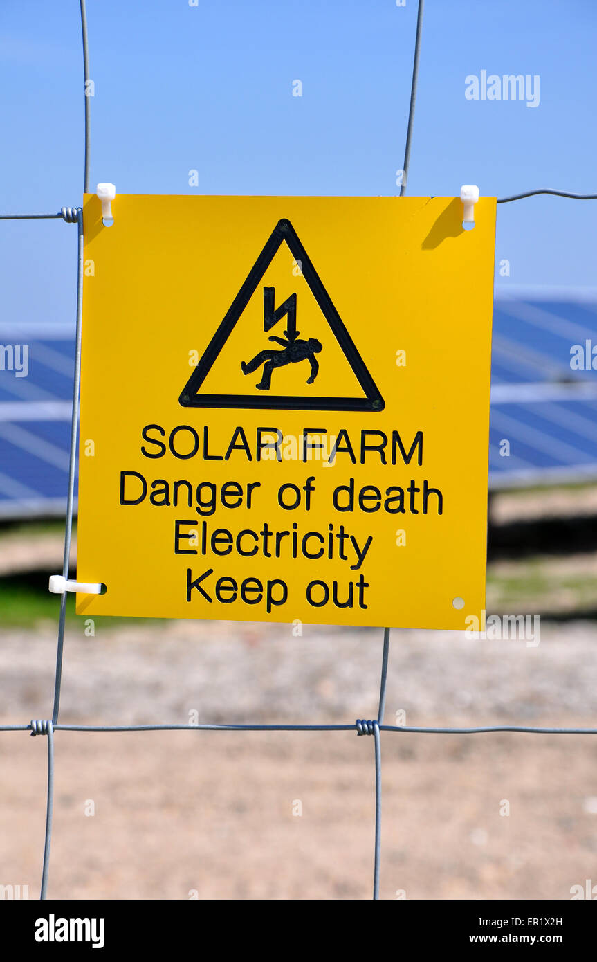 Solar farm danger warning sign Stock Photo Alamy